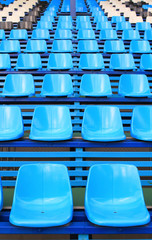Naklejka premium Blue empty stadium seats