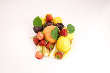  Fresh orange, lemons, strawberries and plums
