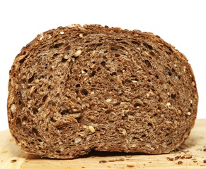 A slice of brown bread with seeds