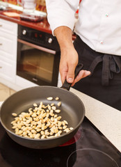 chef preparing almonds