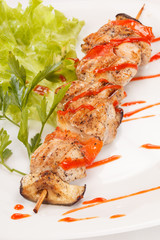 Chicken kebab with tomato sauce