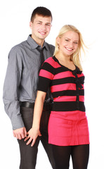 Happy smiling beautiful young couple on white background