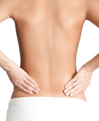 Naklejka premium Loin of an athletic woman, isolated, white background