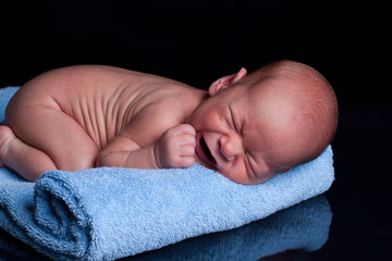 Newborn on towel