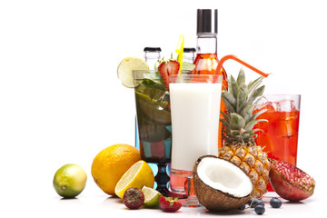 Exotic alcohol drinks set with fruits