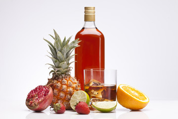 Exotic alcohol drinks set with fruits