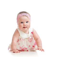 pretty crawling baby girl isolated on white background