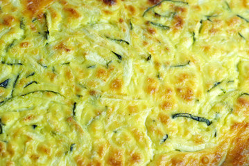 Close-up of courgette and feta souffle. Seasonal dish.