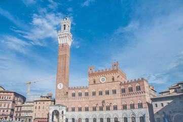 Obraz premium Public Palace and it's Mangia Tower in Siena, Italy
