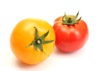 red and yellow tomatoes isolated on white
