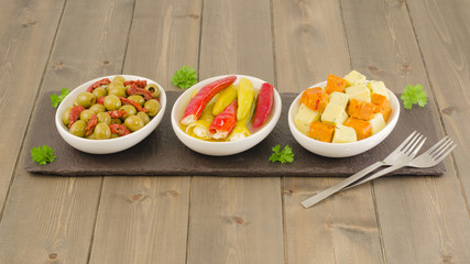 Tapas - Olives & sun-dried tomato, stuffed chillies & cheese