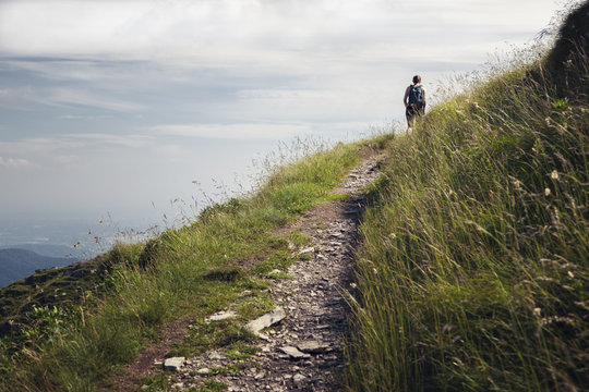 Woman On Hiking Path