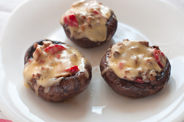 Stuffed mushrooms with cheese.
