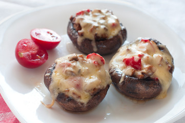 Stuffed mushrooms with cheese.