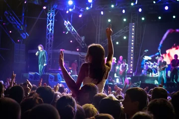 Tuinposter silhouettes of concert crowd © Dusan Kostic
