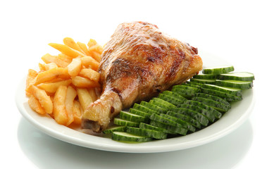 Roast chicken with french fries and cucumbers
