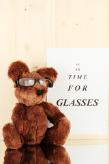 Eyesight test chart with glasses and with toy