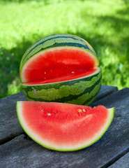 water melon on wooden garden table