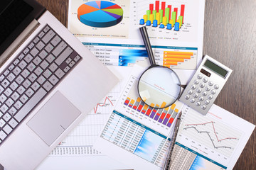 Businessman workplace with papers