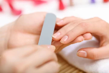 Foto op Plexiglas Woman is getting manicure © Sergey Nivens