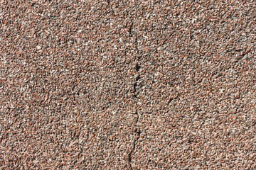 Cracked small granite wall background