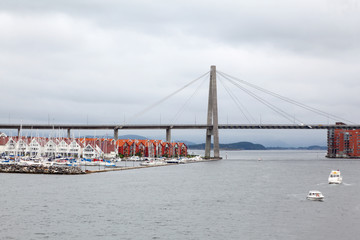 Big cable suspension bridge at dull day in Stavanger, Norway.