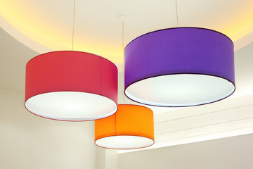 Purple, red and orange round stylish lampshades hang