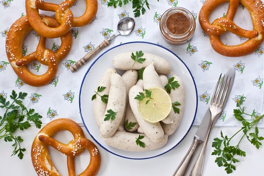 Munich white sausages with sweet mustard and pretzel