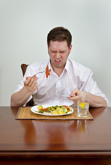 Man is disappointed with his dish