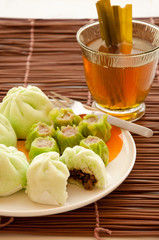 Steamed dumplings wih cup of tea