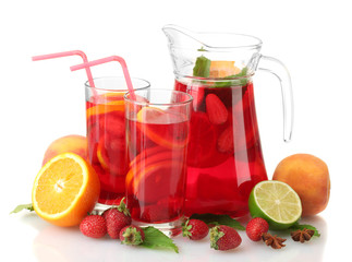 sangria in jar and glasses with fruits, isolated on white