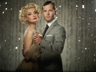Retro couple over blurred background
