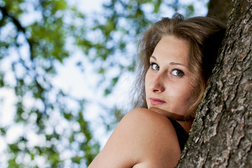 beautiful girl on a background of park