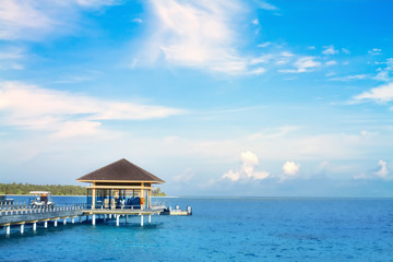 Island in ocean, overwater villa with endless swimming pools. Ma