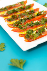 Grilled red pepperoni with anchovies
