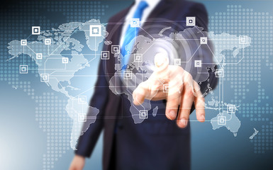 Businessman pressing social media icon