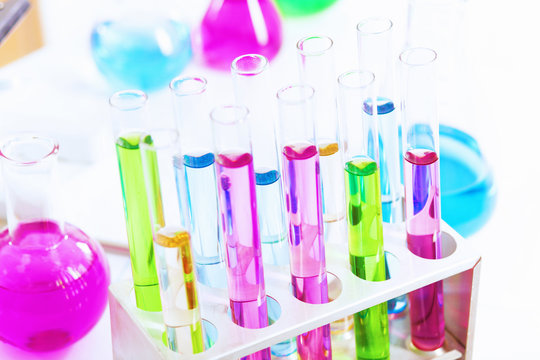 Chemistry laboratory glassware with colour liquids