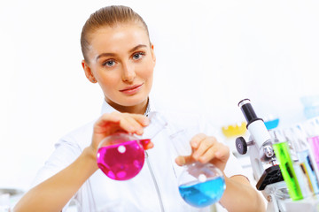 Young female scientist working in laboratory