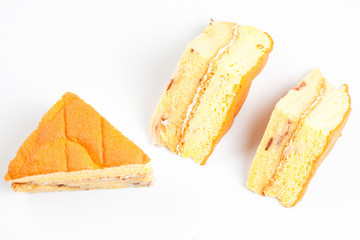 3 peice of yellow cake on a white background