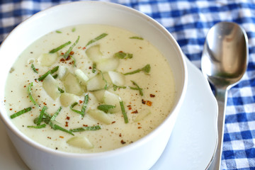 Chilled and creamy cucumber gazpacho with mint and chili flakes