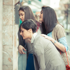 Young Women in front of a Clothing Store