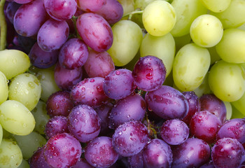 green and rose grapes background