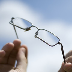 Glasses in hands