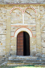 Romagna Apennines, San-Leo village ancient church entrance