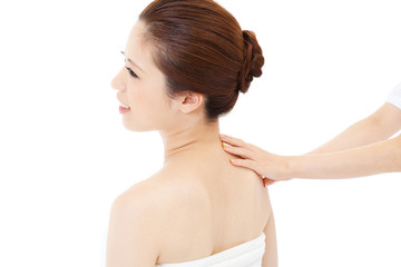 Beautiful young woman in spa