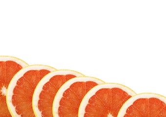 Ripe sliced of red grapefruit isolated on white background