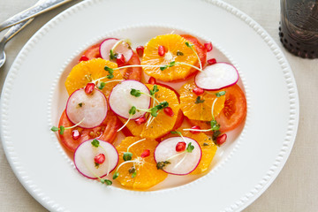 Orange,Pomegranate and tomato salad