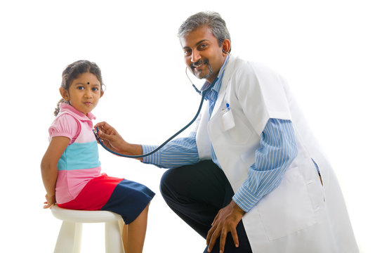 Asian Indian Doctor With A Young Girl