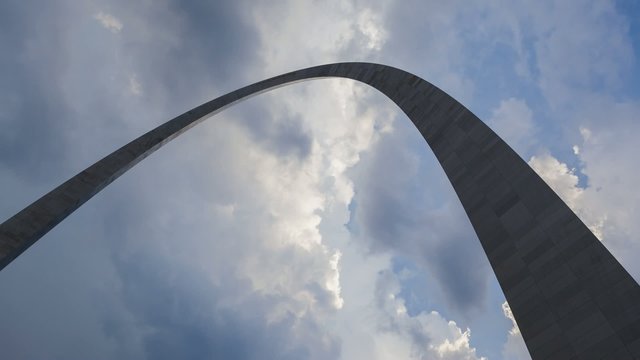 Timelapse St. Louis Arch with dramatic clouds in the background 