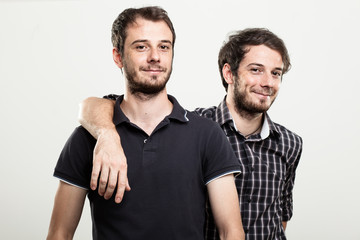 Two Happy Twins Hugging